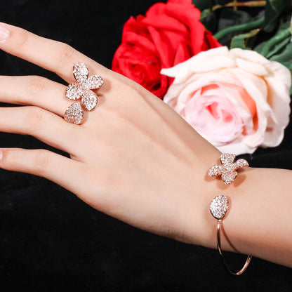Fiori di Luce – Conjunto de pulsera y anillo de circonitas florales | Oro rosa y plata | Serenyah