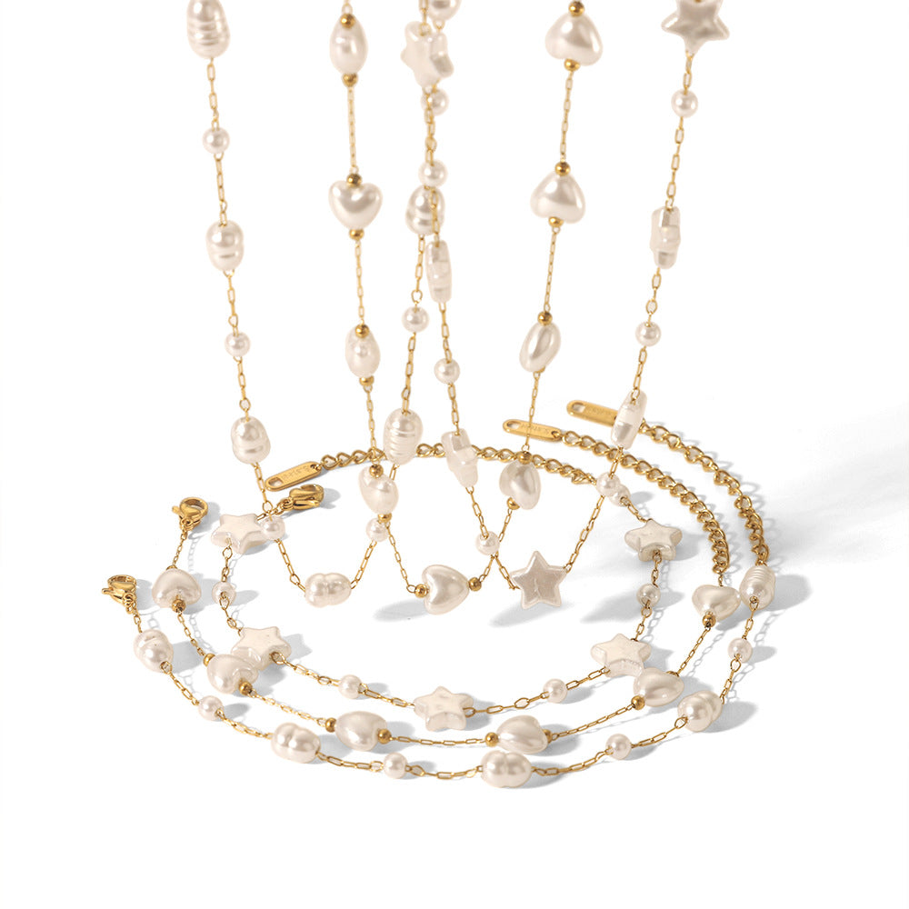 Costellazione di Perle – Pulsera de Perlas de Acero Inoxidable Dorado con Estrellas y Corazones | Serenyah