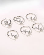 Lettera Ring – Ring with studded initial and solitaire zirconia, silver and adjustable