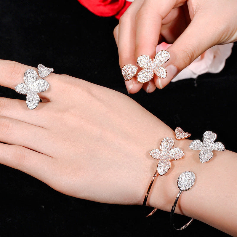 Fiori di Luce – Conjunto de pulsera y anillo de circonitas florales | Oro rosa y plata | Serenyah