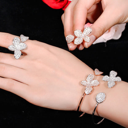 Fiori di Luce – Conjunto de pulsera y anillo de circonitas florales | Oro rosa y plata | Serenyah